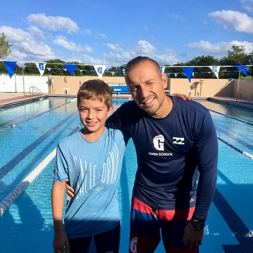 Coach Roman and  his Gulliver  swim school's swimm
