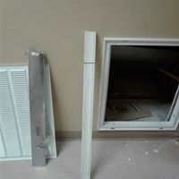 Cutting a space in the wall for A/C ventilation gr