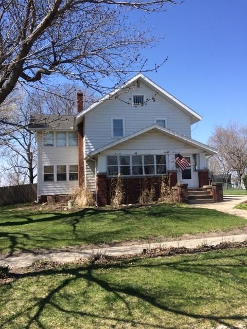 Before photo of a house painted in Granger, IA.
