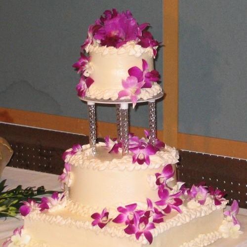 Fresh Orchid Wedding Cake
Buttercream adorned with