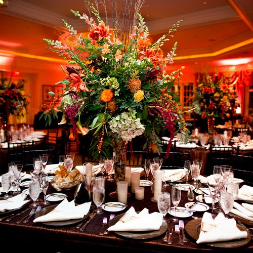 Designed centerpieces, rental for chairs, linens a