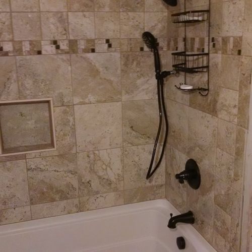 tub and tile portion of full bathroom remodel