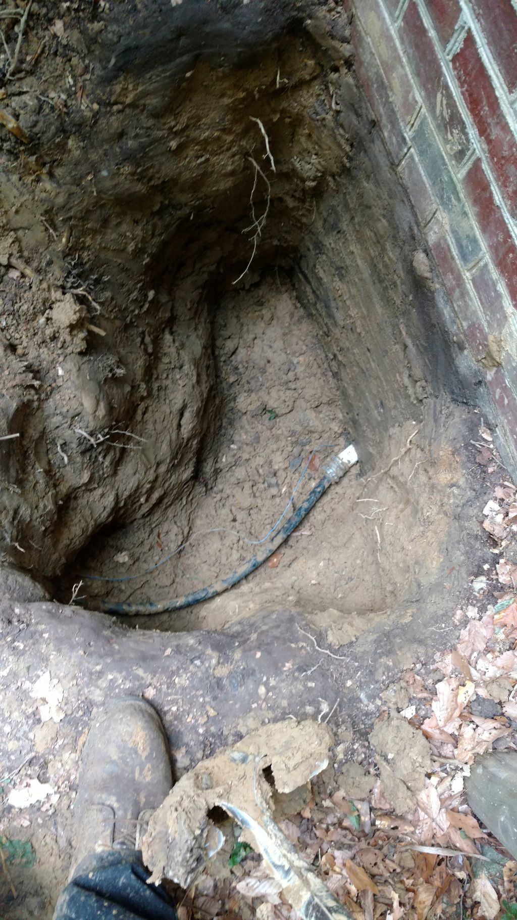 water line with fernco and sleeve though wall afte