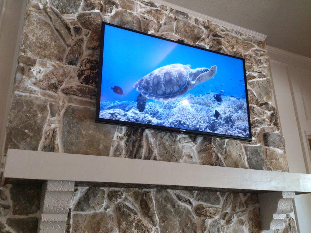 Masonry fireplace TV installation, home in Dallas,