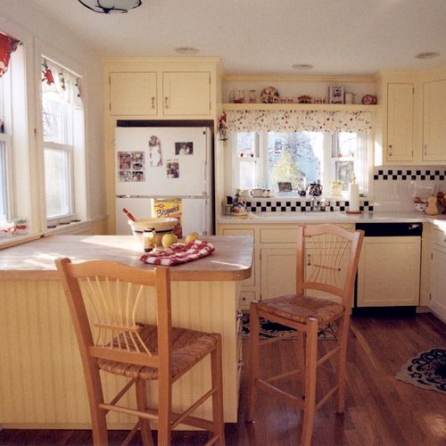 From dreary 70's kitchen with dark oak cabinets, t