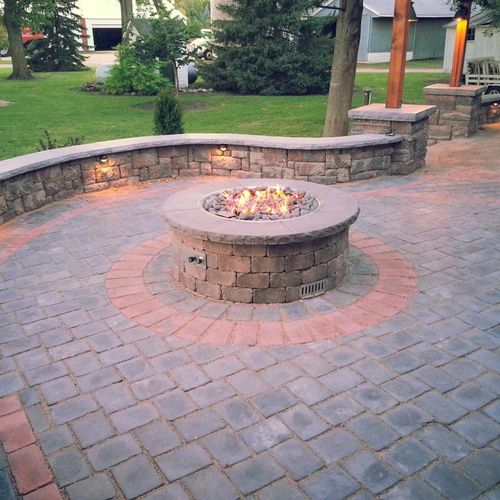Finished raised patio with gas fire pit and lighti