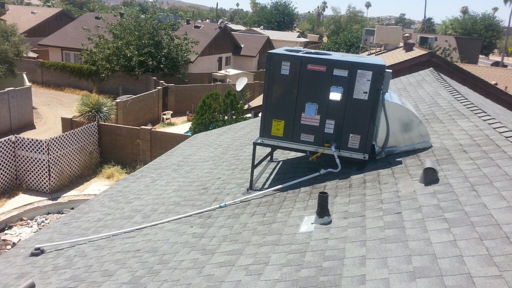 New unit, stand, elbow, and condensate drain line.