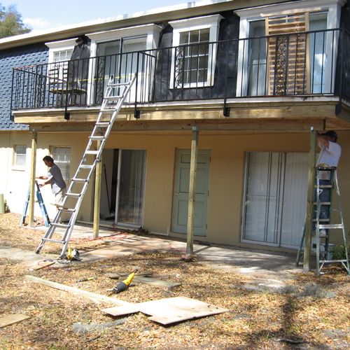 overview of balcony repair, window and mansurd wal