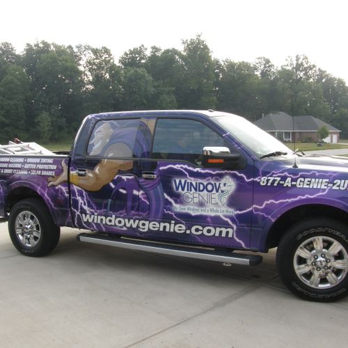 Our employees drive wrapped Window Genie trucks fo