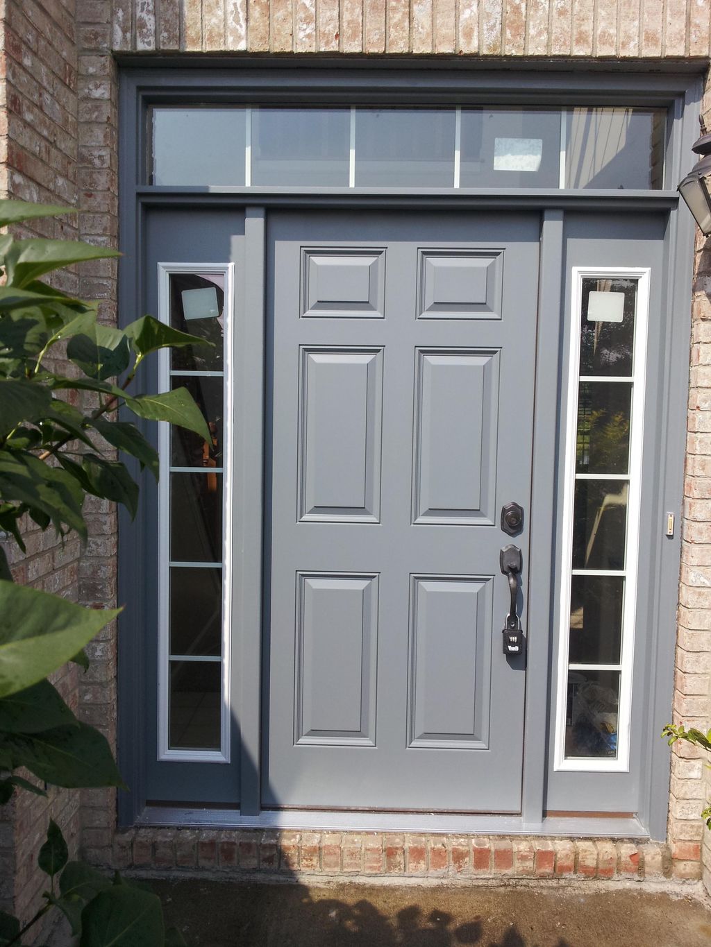 Door and surrounding window trim painting.