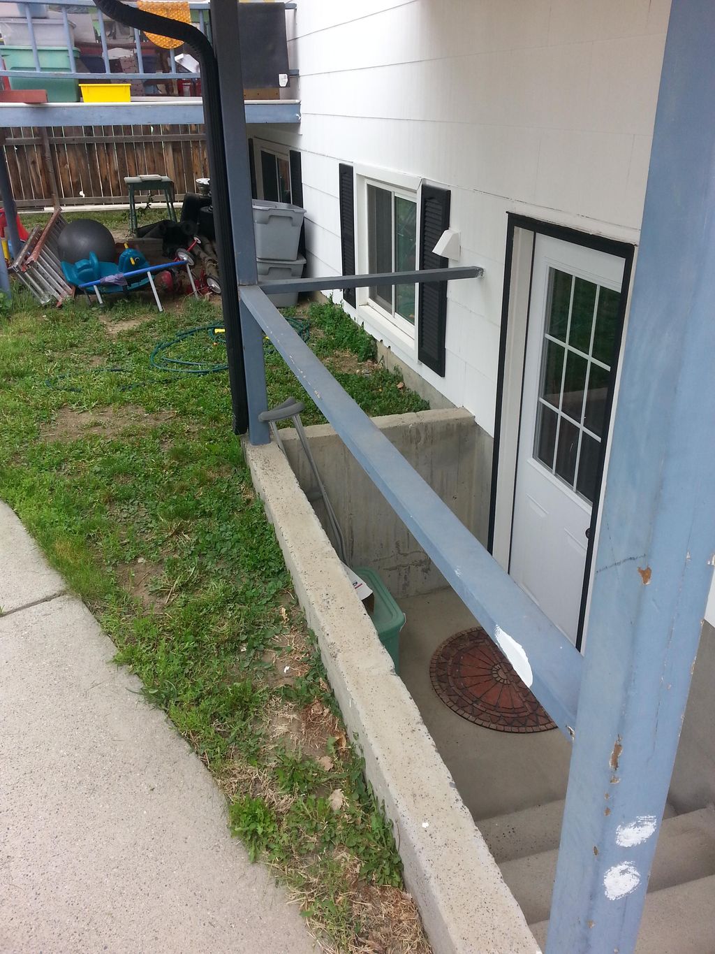 2-B4 pic of basement entrance railing and bottom s