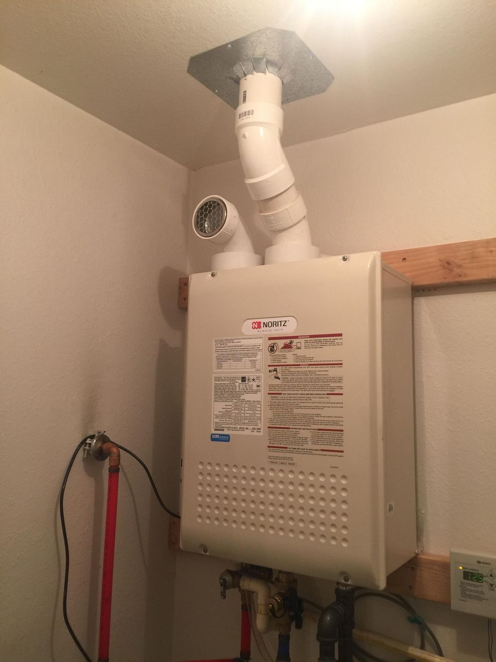 Tankless gas water heater.  Unlimited hot water is