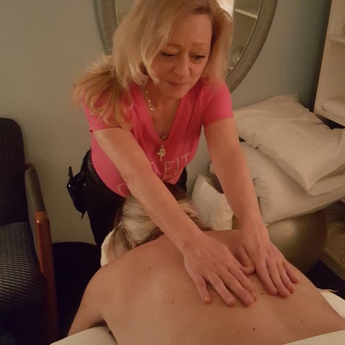Swedish Massage being performed on the back,  Rela