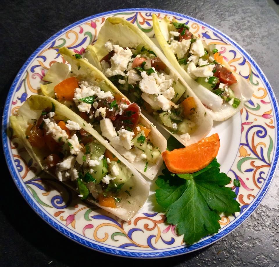 Handheld endive salad bites with red wine citrus v