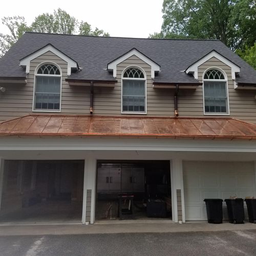 New standing seam copper roof and copper half roun