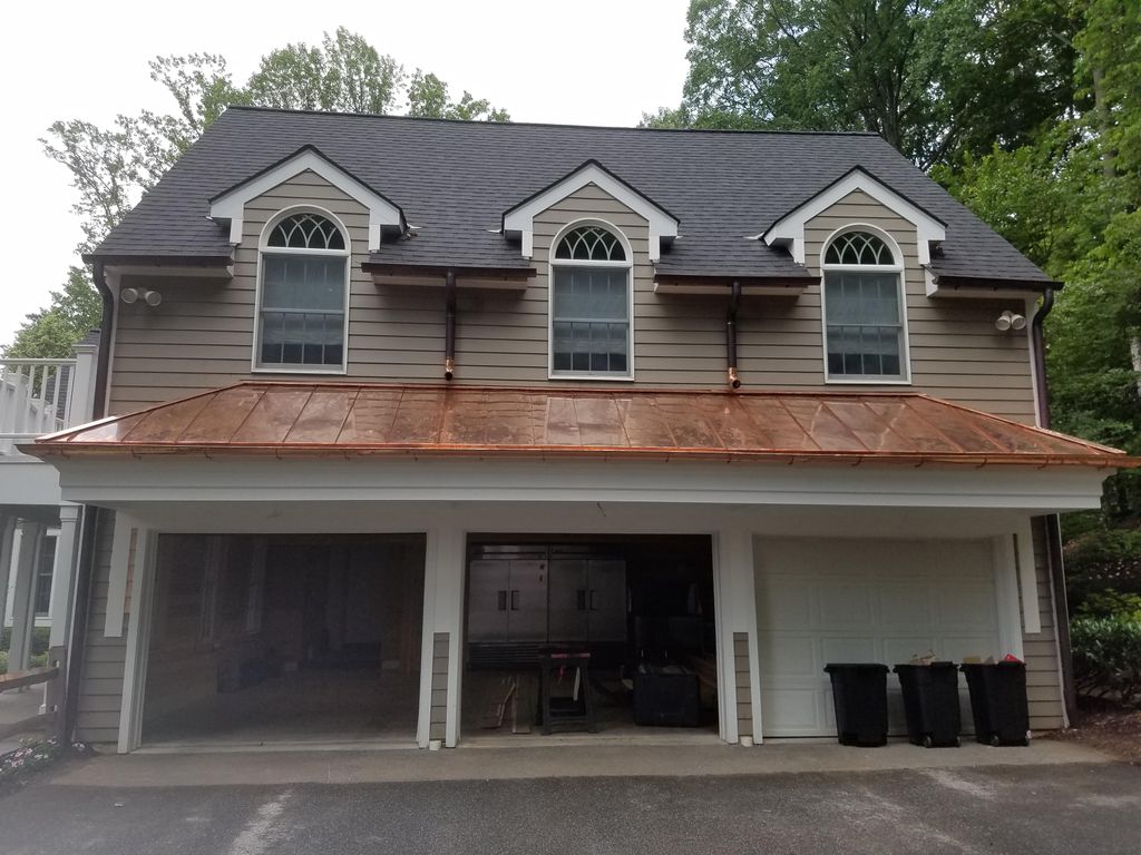 New standing seam copper roof and copper half roun