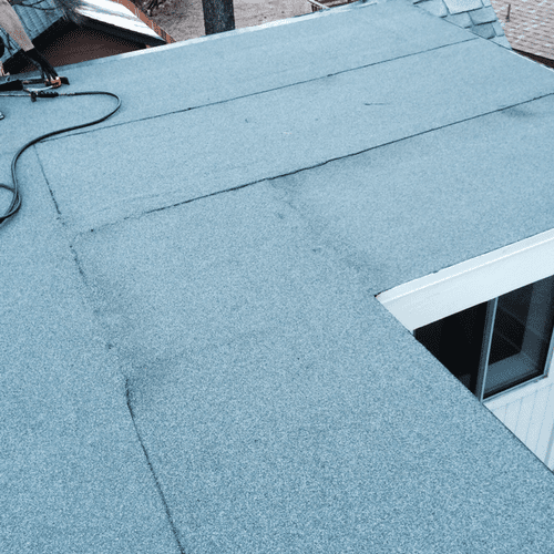 Torch Down Roofing System Over
Low Pitched Area