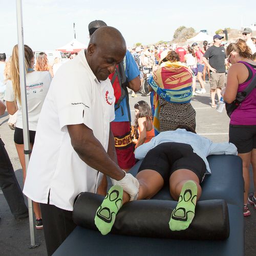 Working on an athlete at O C Tri Event in Newport 