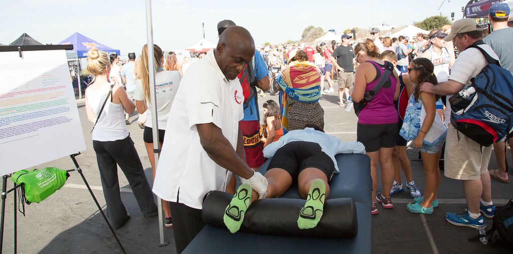 Working on an athlete at O C Tri Event in Newport 
