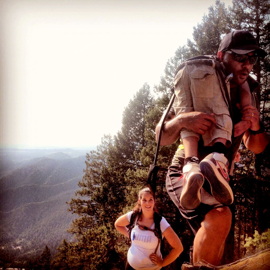 Anthony prepared to carry his son up the incline t