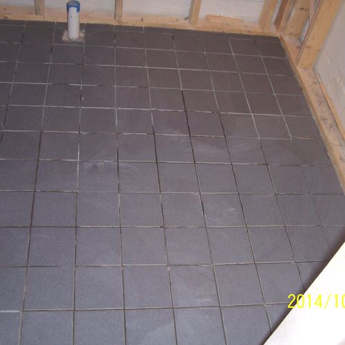 Porcelain or Ceramic tile flooring
