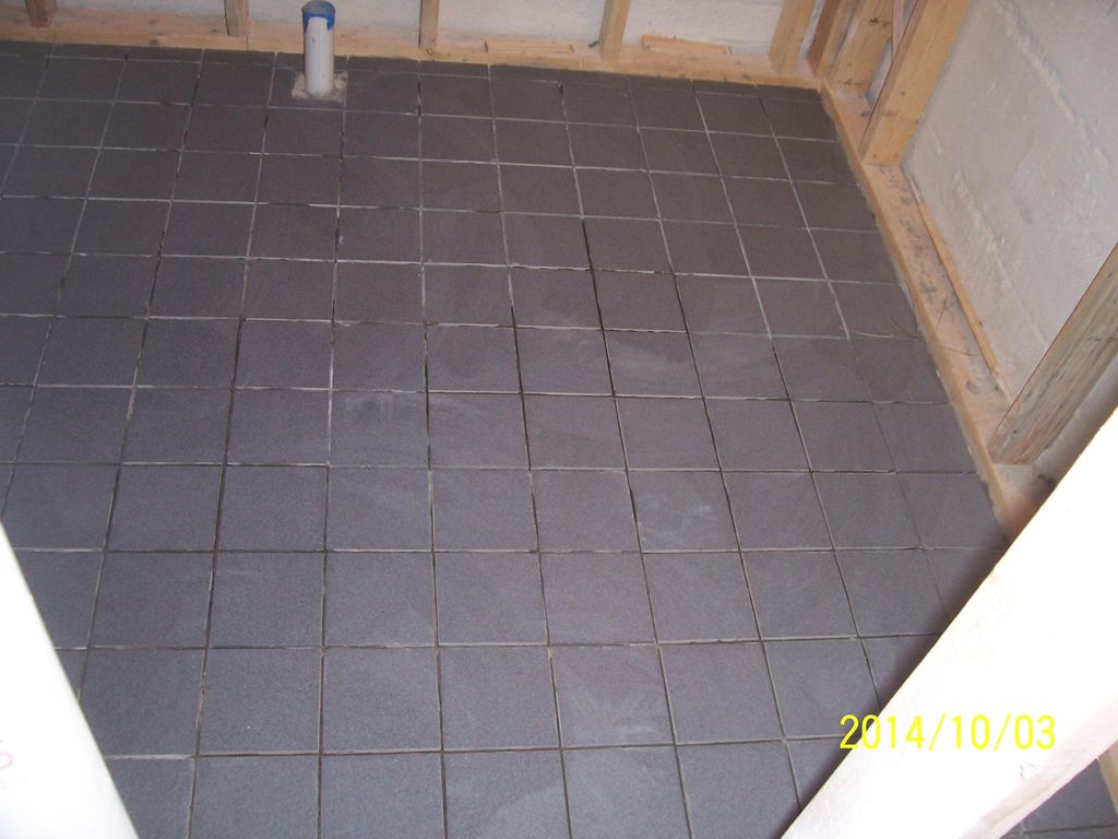 Porcelain or Ceramic tile flooring