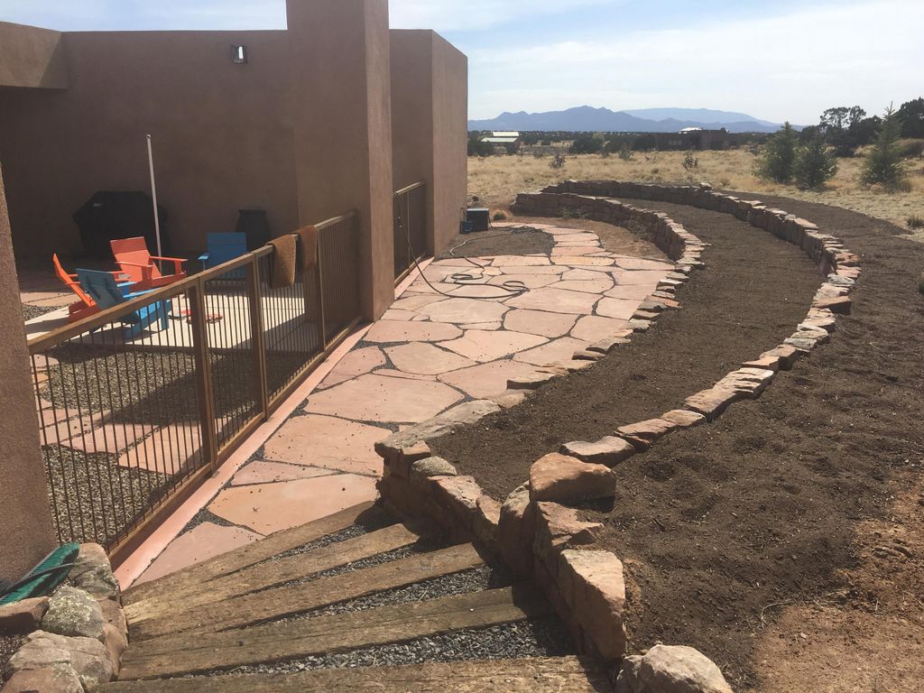 Hardscape installed, ready for new plants and an i