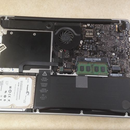 Opening up a Macbook Pro for a keyboard replacemen