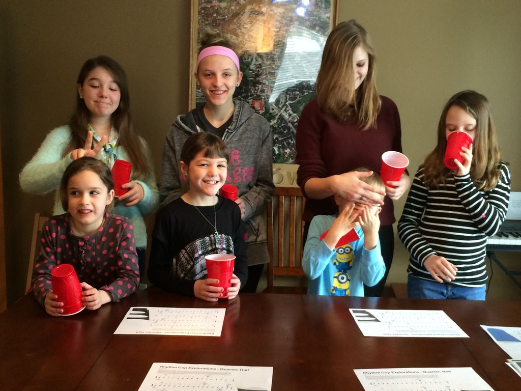 rhythm cups at a group lesson