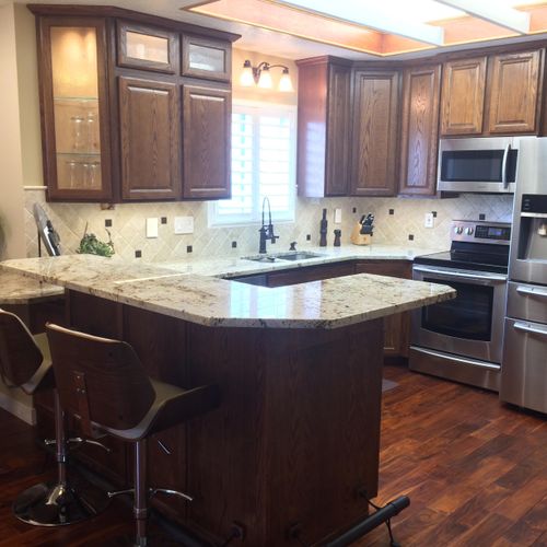 Photo of kitchen after remodel. Includes new skyli