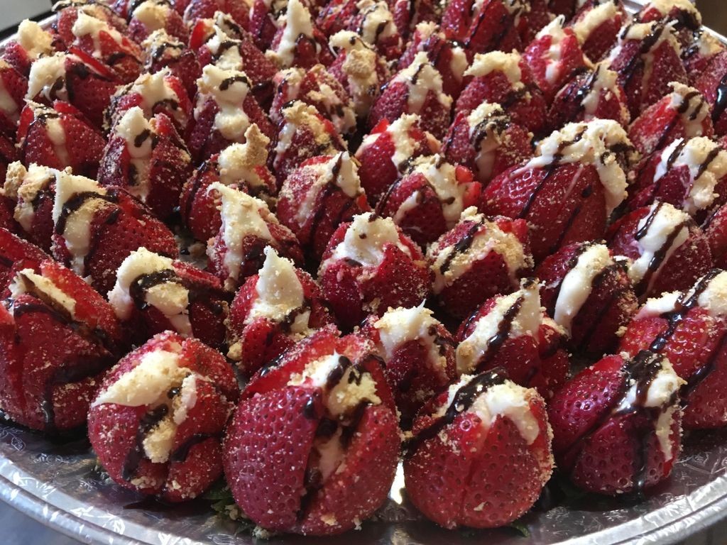 Cheesecake stuffed strawberries topped with crushe