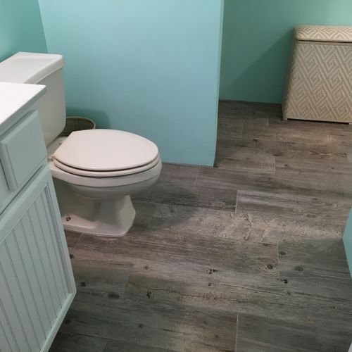 Bathroom tile flooring. Customer did not want base