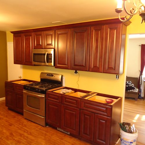 Kitchen floors, tile, cabinets, sinks & faucets, a