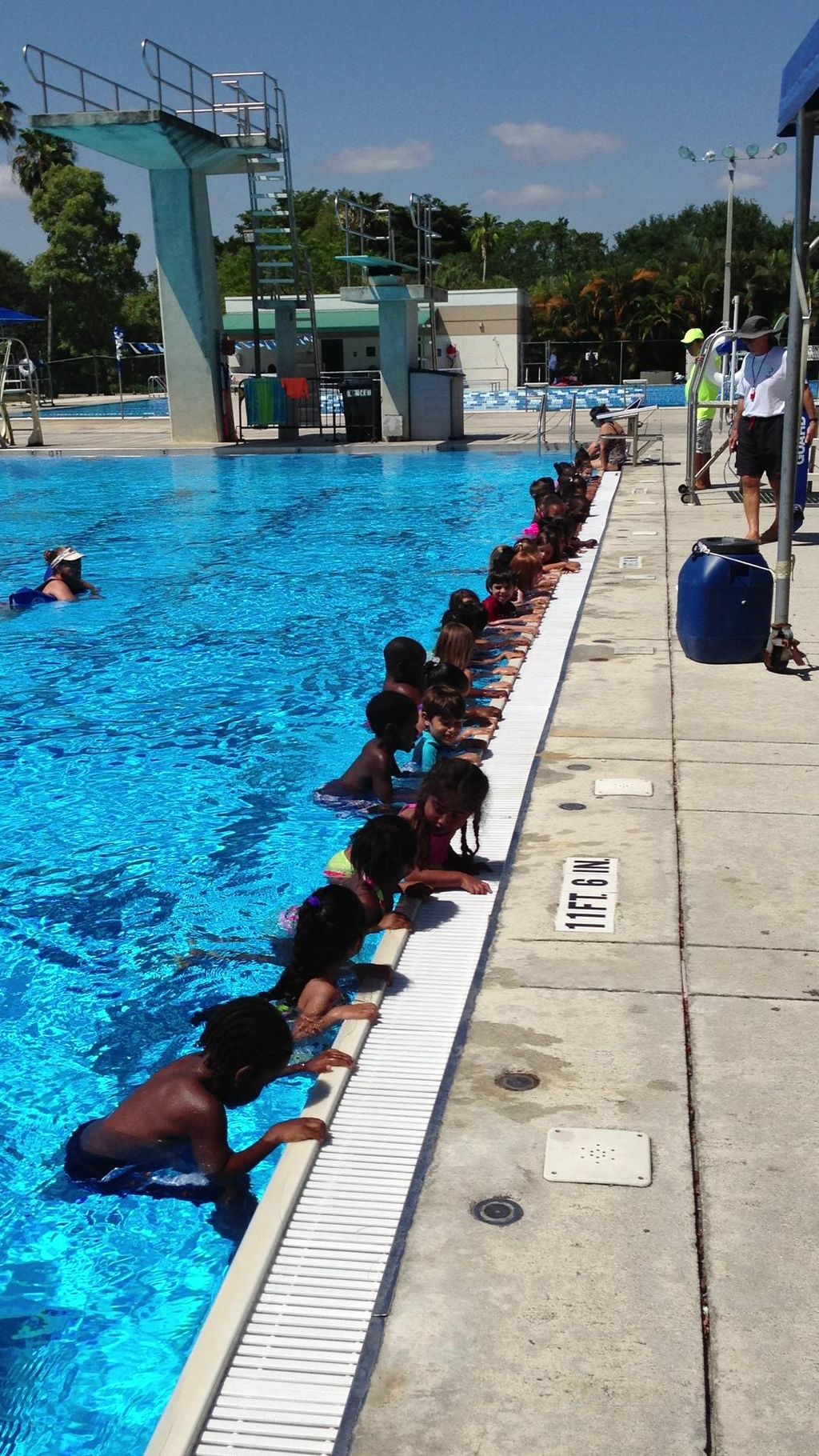 Our instructors leading a camp's water safety prog