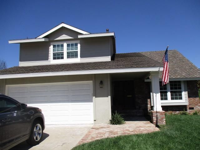 Owens Corning Woodmoor. Color: Maplewood