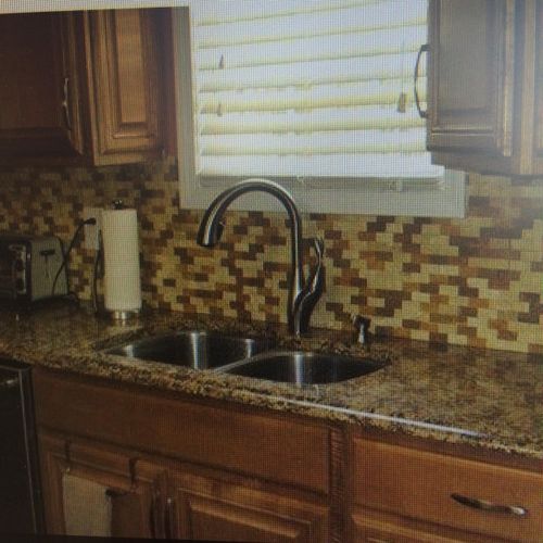 Kitchen counter, sink, fronts of cabinets