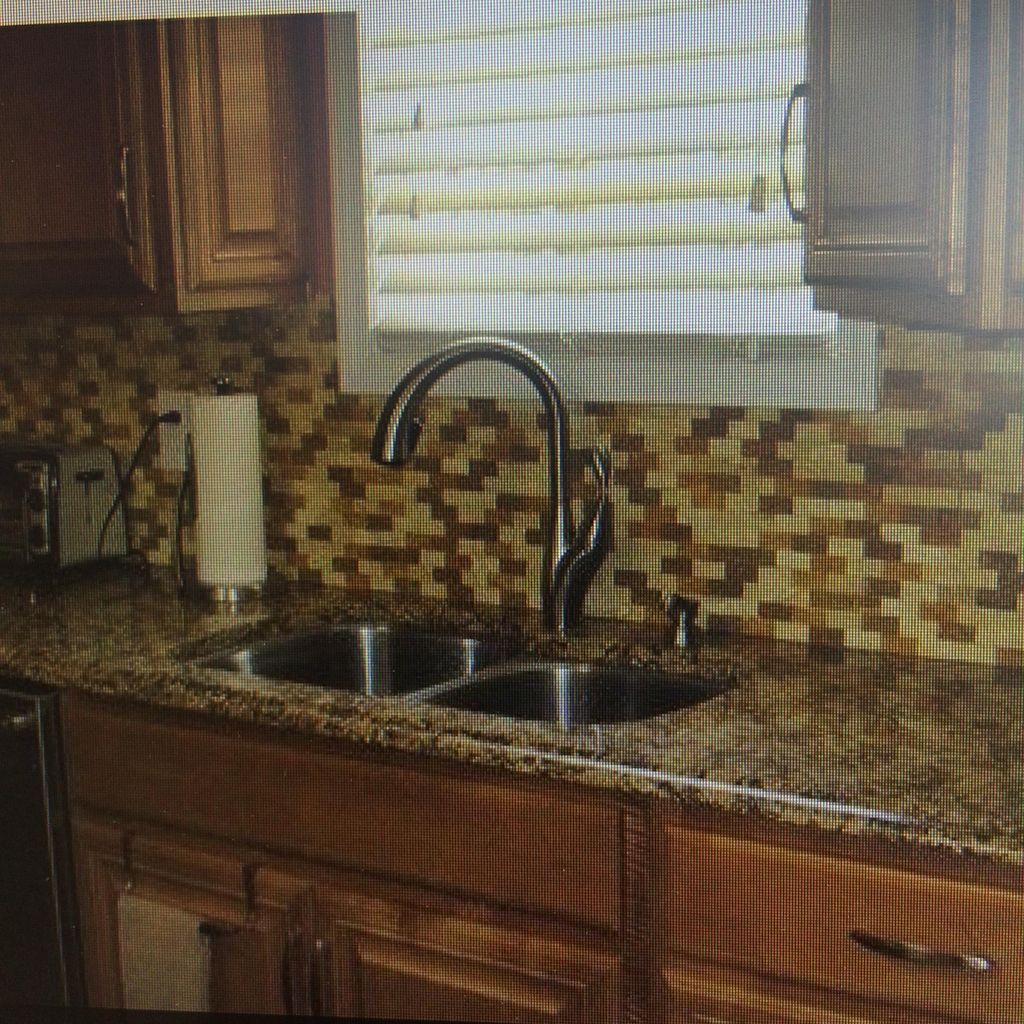 Kitchen counter, sink, fronts of cabinets