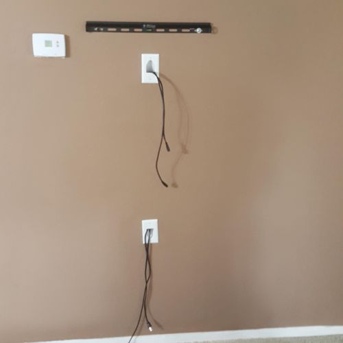Single rail Tilt mount with wires through wall. 