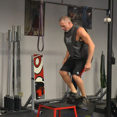 Rob is practicing his Box Jumps.