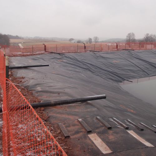 Placement of Discharge pipes at a fracking pond
