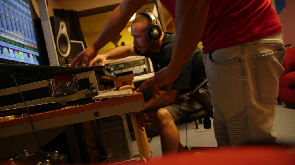 Me mixing a session with help of an assistant engi