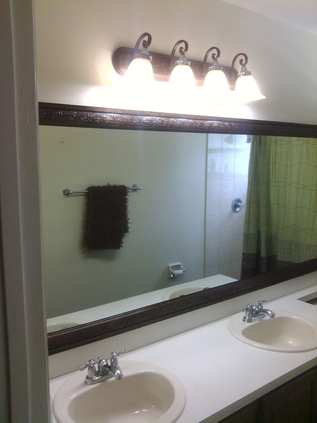 After with new lights that match the mirror