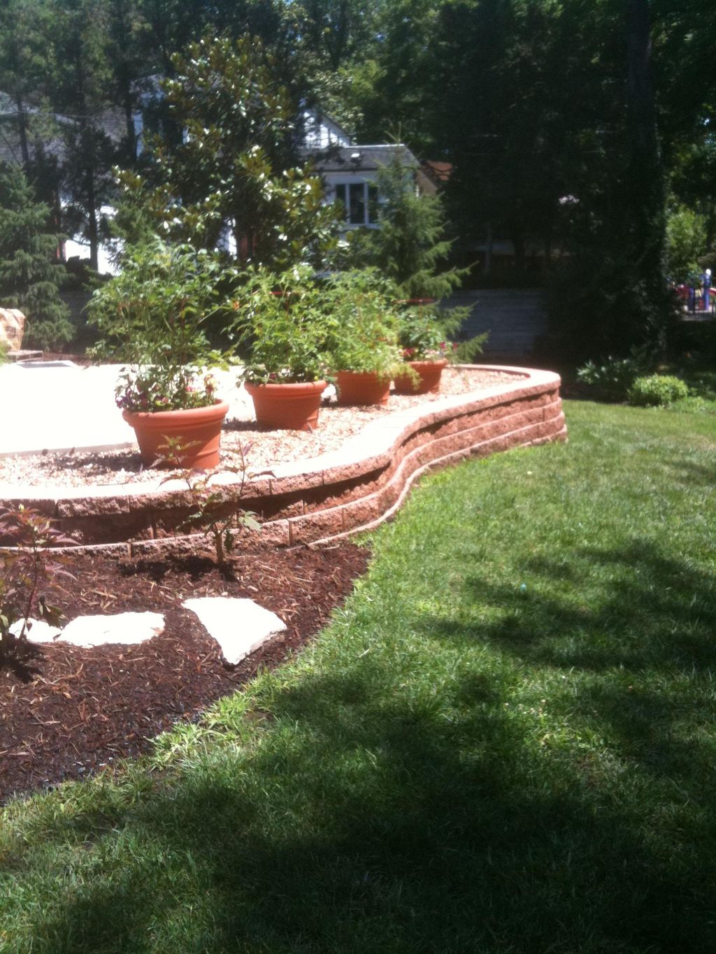 Containers with vegetables and flowers in Ladue, M