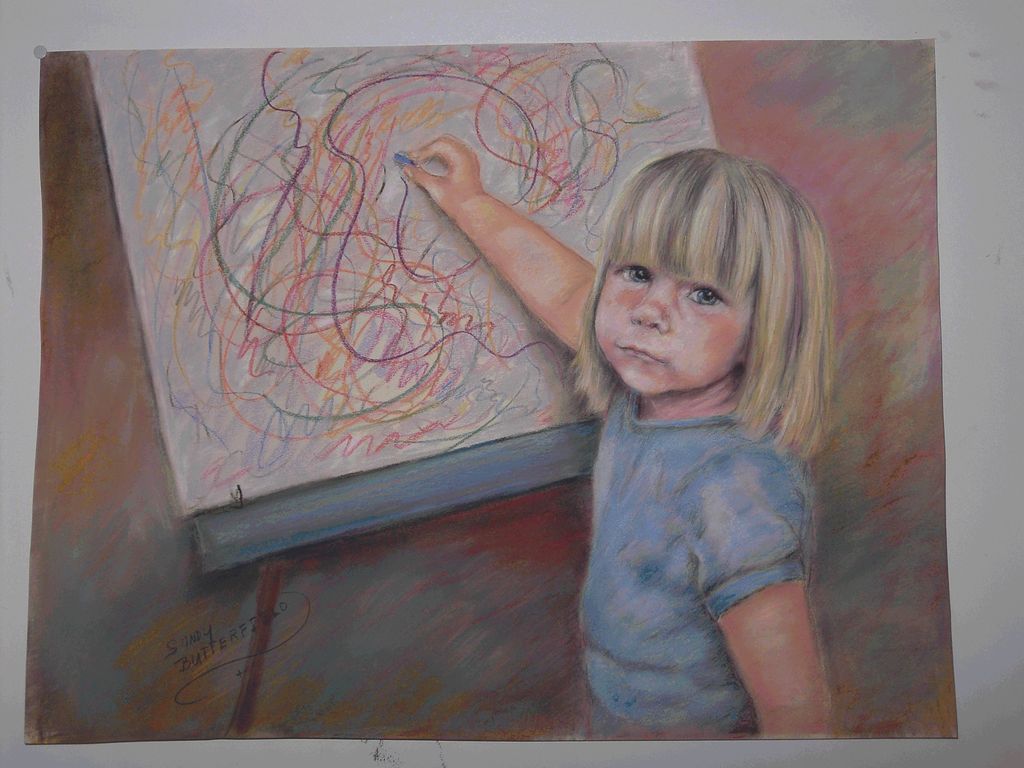 Rachel .My little granddaughter at the easel.