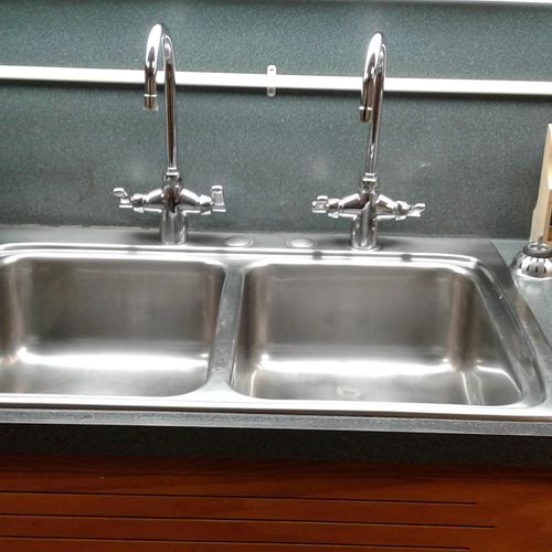 sink and plugs sparkling clean. After cleaning and