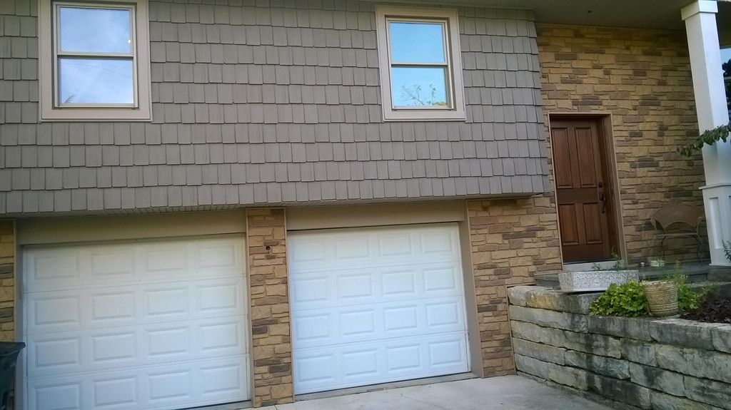 new vinyl siding and vinyl "stone". total exterior