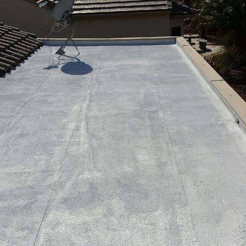 Coated deteriorating roof with an "Elastomeric Roo