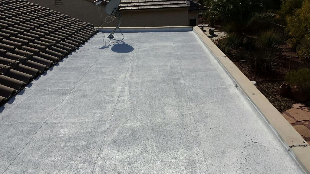 Coated deteriorating roof with an "Elastomeric Roo