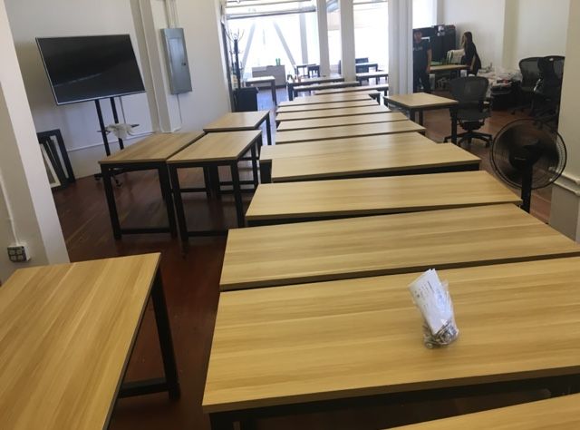 a bunch of desks a colleague and I assembled for a