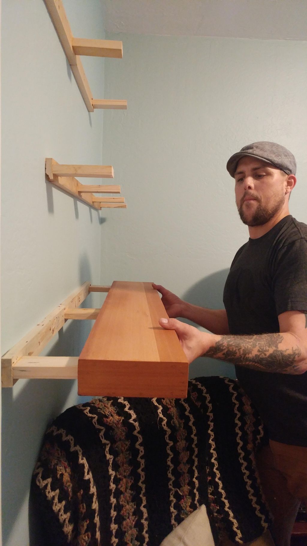 Installing custom built clear cedar floating shelv